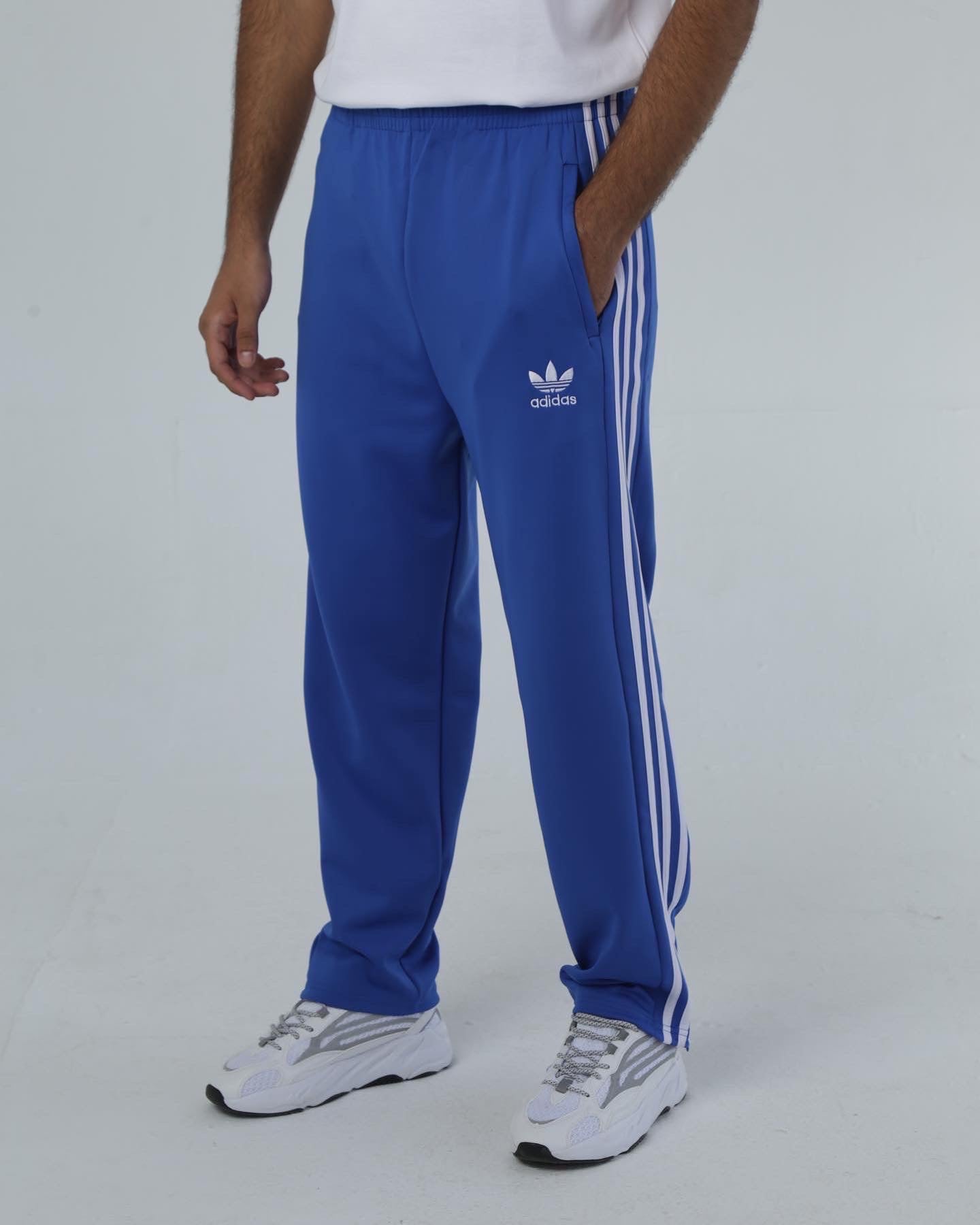 Blue and white adidas joggers online